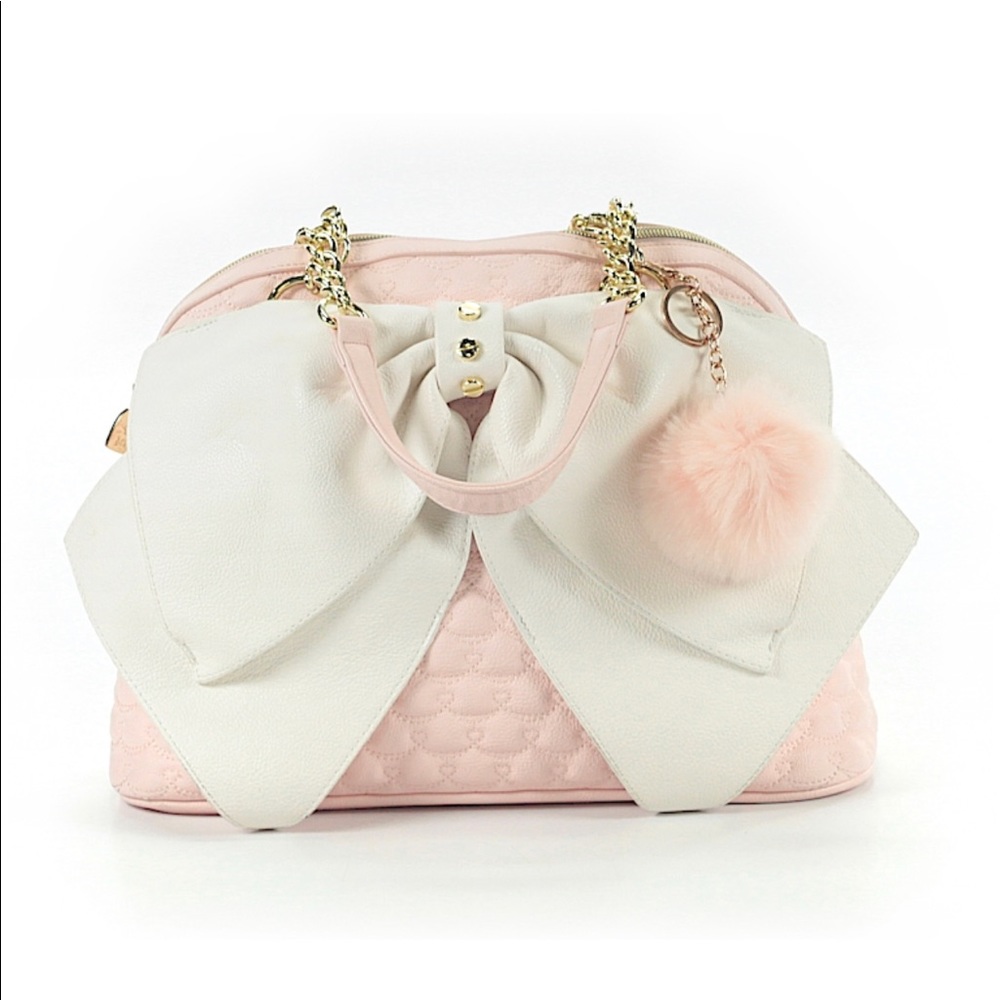 Betsey Johnson- pink satchel with ribbon.